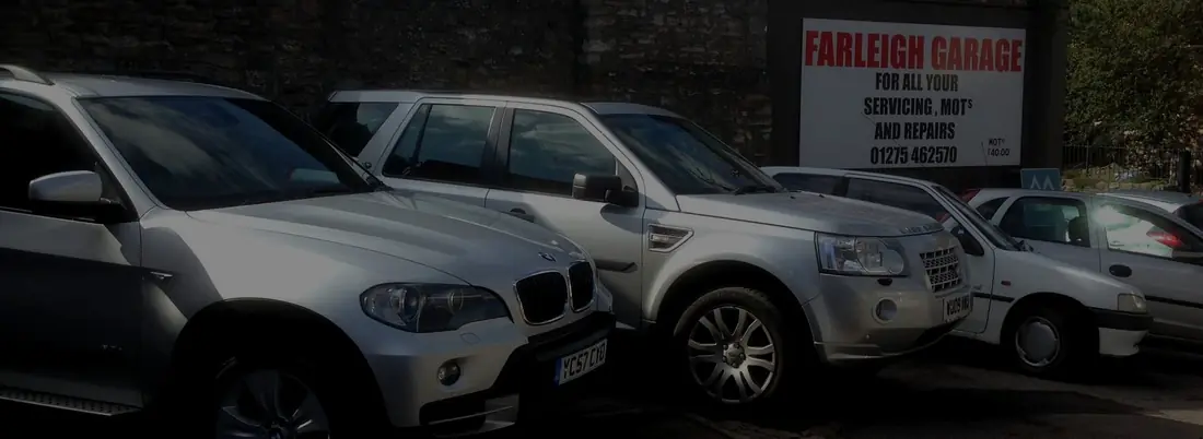 Cars on the forecourt at Farleigh Garage, Backwell